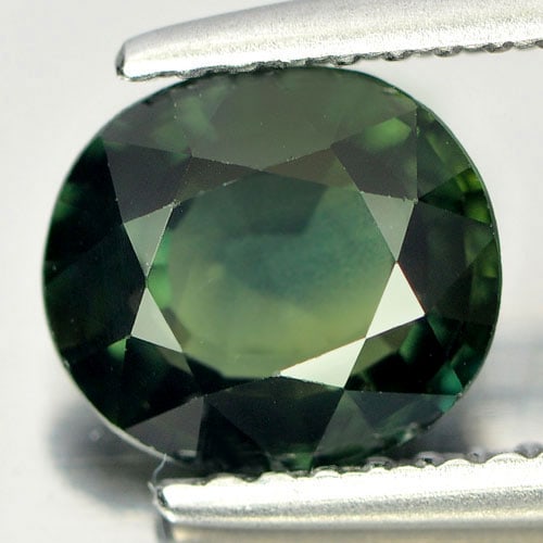 Blue Green Sapphire 1.76 Ct. Clean Oval Shape 7.8 x 7 Mm. Natural Gemstone From Thailand: Product ID: 806148464 Product Name: Natural Green Sapphire Weight: 1.76 CT. Size: 7.8 x 7 x 3.9 MM. Shape: Oval Color: Blue Green Clarity:IF Luster: Very Good Gems Origin: Thailand Treatment: Heated C
