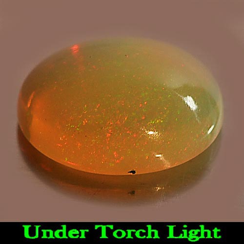 Multi Color Play Of Color Opal 1.18 Ct. Oval Cabochon Shape 9 x 6.9 Mm. Natural Unheated Gemstone: Product ID: 818725227 Product Name: Natural Opal Weight: 1.18 CT. Size: 9 x 6.9 x 3.9 MM. Shape: Oval Cabochon Color: Multi-Color Clarity:Semi - Transparent Luster: Iridescent Gems Origin: Ethiopia Tr