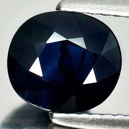 Blue Sapphire 2.08 Ct. Oval Shape 8.3 x 7.5 Mm. Natural Gemstone From Thailand: Product ID: 806007015 Product Name: Natural Blue Sapphire Weight: 2.08 CT. Size: 8.3 x 7.5 x 3.9 MM. Shape: Oval Color: Blue Clarity:VSI Luster: Good Gems Origin: Thailand Treatment: Heated Crystal St