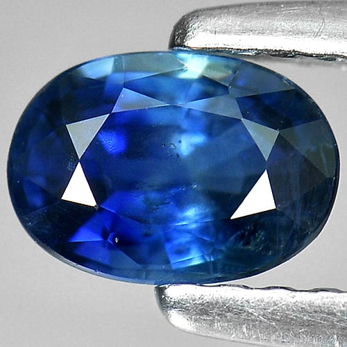 Blue Sapphire 0.71 Ct. Oval Shape 6 x 4.2 Mm. Natural Gemstone From Thailand: Product ID: 806008560 Product Name: Natural Blue Sapphire Weight: 0.71 CT. Size: 6 x 4.2 x 3 MM. Shape: Oval Color: Blue Clarity:SI Luster: Good Gems Origin: Thailand Treatment: Heated Crystal Structu
