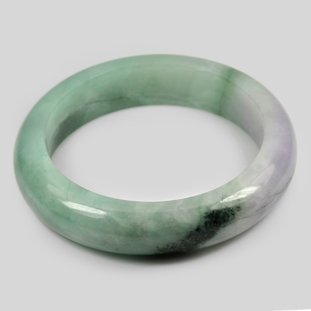 Natural Gemstone Multi-Color Jade Bangle Unheated 464 Ct. Size 80 x 61 x 16 Mm.: Product ID: 819814247 Product Name: Natural Jade Weight: 464.00 CT. Size: 80 x 61 x 16 MM. Shape: Round Color: Multi-Color Clarity:Opaque Luster: Good Gems Origin: Thailand Treatment: Unheated Crystal