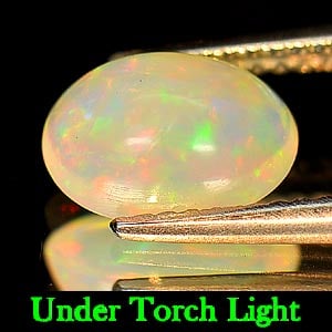 Multi Color Opal 1.14 Ct. Oval Cabochon Shape 8.9 x 6.3 Mm. Natural Unheated Gemstone From Ethiopia: Product ID: 818713263 Product Name: Natural Opal Weight: 1.14 CT. Size: 8.9 x 6.3 x 4.3 MM. Shape: Oval Cabochon Color: Multi Color Clarity:Semi - Transparent Luster: Good Gems Origin: Ethiopia Treatm
