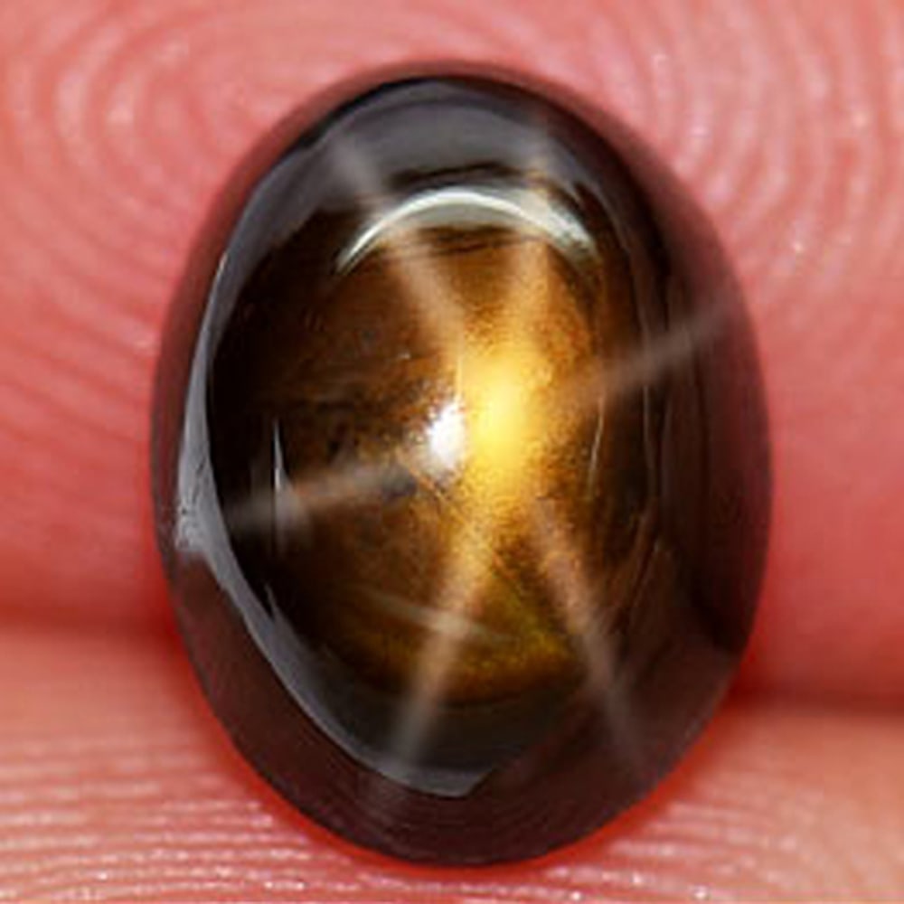 Certified Golden Star 6 Rays Sapphire 3.10 Ct. Oval Cabochon Shape 6.61 x 8.73 Mm. Natural Gemstone: Product ID: 806149992 Product Name: Natural Star Sapphire Weight: 3.10 CT. Size: 6.61 x 8.73 x 4.50 MM. Shape: Oval Cabochon Color: Yellow Clarity:Opaque Luster: Good 6 Ray Star Gems Origin: Thailand 