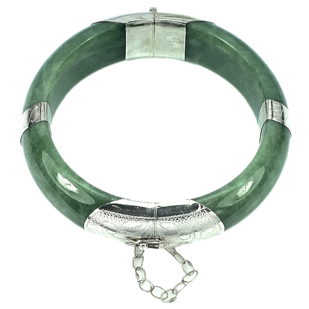 Natural Green Jade Bangle Silver Diameter 56 Mm. 344.34 Ct. Beautiful Unheated: Product ID: 819812604 Product Name: Natural Jade Weight: 344.34 CT. Size: 70 x 56 x 17 MM. Shape: Round Cabochon Color: Green Clarity:Opaque Luster: Good Gems Origin: Thailand Treatment: Unheated Crys