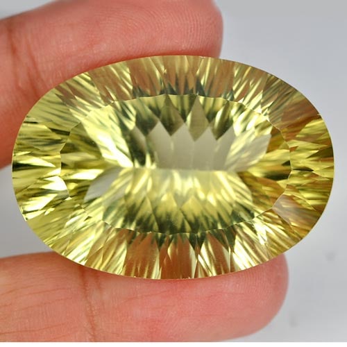 Yellow Lemon Quartz 88.12 Ct. Clean Oval Concave Cut Shape 38 x 26 Mm. Natural Gemstone From Brazil: Product ID: 805526362 Product Name: Natural Quartz Weight: 88.12 CT. Size: 38 x 26 x 16.1 MM. Shape: Oval Concave Cut Color: Yellow Clarity:IF Luster: Good Gems Origin: Brazil Treatment: Unheated Crys