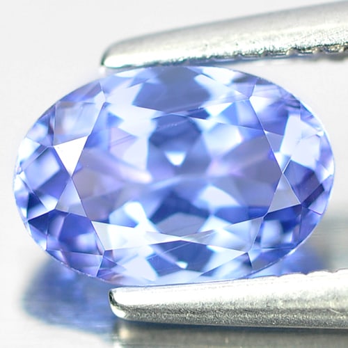 Natural Violet Blue Tanzanite 0.90 Ct. Oval Shape 7.1 x 4.9 Mm. Gemstone From Tanzania: Product ID: 807004645 Product Name: Natural Tanzanite Weight: 0.90 CT. Size: 7.1 x 4.9 x 3.5 MM. Shape: Oval Color: Violet Blue Clarity:VSI Luster: Good Gems Origin: Tanzania Treatment: Heated Crystal