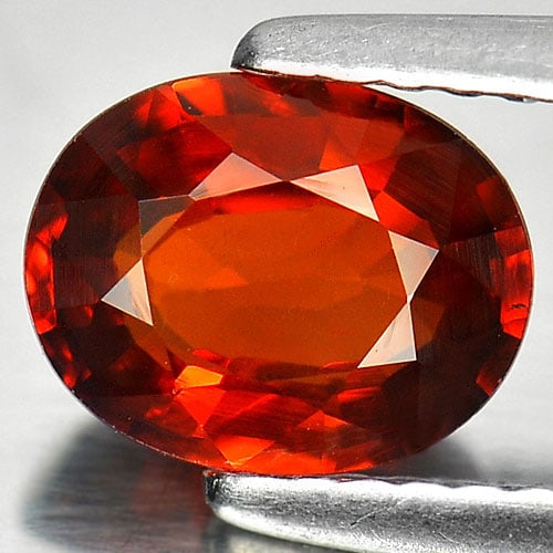 Orange Red Spessartine Garnet 1.52 Ct. VS Oval Shape 7.7 x 6 Mm. Natural Unheated Gemstone From: Product ID: 802935301 Product Name: Natural Spessartine Weight: 1.52 CT. Size: 7.7 x 6 x 3.3 MM. Shape: Oval Color: Red Clarity:VS Luster: Very Good Gems Origin: Nigeria Treatment: Unheated Crystal St