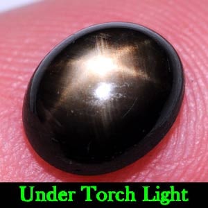 Black Star 6 Rays Sapphire 2.26 Ct. Oval Cabochon Shape 7.9 x 6.5 Mm. Natural Gemstone From: Product ID: 806139503 Product Name: Natural Star Sapphire Weight: 2.26 CT. Size: 7.9 x 6.5 x 4 MM. Shape: Oval Cabochon Color: Black Clarity:Opaque Luster: Good 6 Rays Star Gems Origin: Thailand Treat
