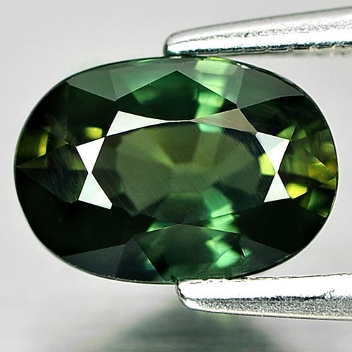 Green Sapphire 1.73 Ct. VVS Oval Shape 8.2 x 5.8 Mm. Natural Gemstone From Thailand: Product ID: 806152650 Product Name: Natural Green Sapphire Weight: 1.73 CT. Size: 8.2 x 5.8 x 4 MM. Shape: Oval Color: Green Clarity:VVS Luster: Very Good Gems Origin: Thailand Treatment: Heated Cryst