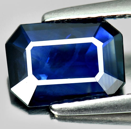 Certified Blue Sapphire 1.84 Ct. Octagon Shape 9.44 x 6.68 Mm. Natural Gemstone From Thailand: Product ID: 806005592 Product Name: Natural Blue Sapphire Weight: 1.84 CT. Size: 9.44 x 6.68 x 2.36 MM. Shape: Octagon Color: Blue Clarity:SI Luster: Good Gems Origin: Thailand Treatment: Heated Cryst