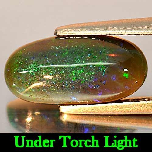 Natural Play Of Color Rainbow Fire Red Black Opal 2.53 Ct. Oval Cabochon Shape 14.6 x 7.2 Mm. (1 of 3)