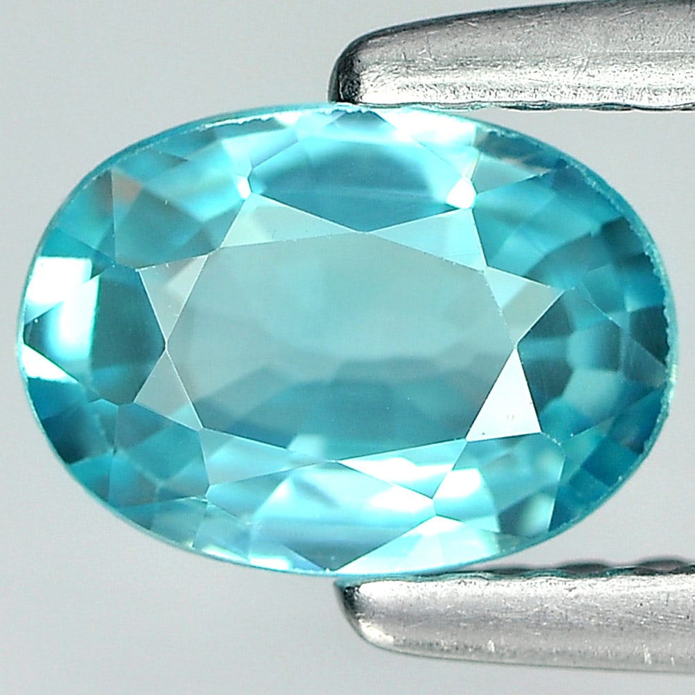 Natural Blue Zircon 1.01 Ct. VVS Oval Shape 7.2 x 5.2 Mm. Gemstone From Cambobia: Product ID: 807730851 Product Name: Natural Zircon Weight: 1.01 CT. Size: 7.2 x 5.2 x 2.5 MM. Shape: Oval Color: Blue Clarity:VVS Luster: Good Gems Origin: Cambodia Treatment: Heated Crystal Structure