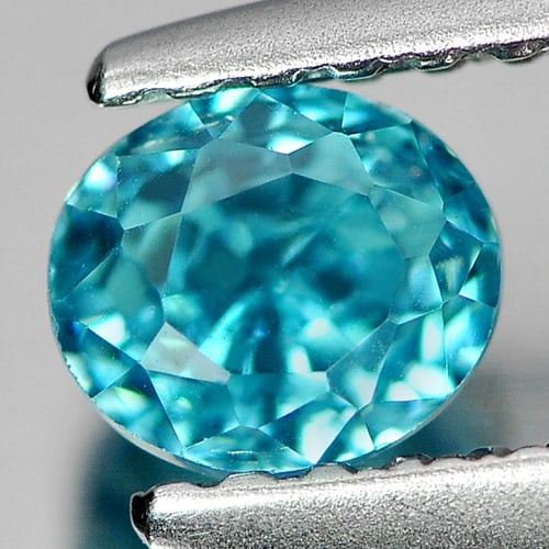 Blue Zircon 0.84 Ct. VVS Oval Shape 4.8 x 4.2 Mm. Natural Gemstone From Cambodia: Product ID: 807713090 Product Name: Natural Zircon Weight: 0.84 CT. Size: 4.8 x 4.2 x 4 MM. Shape: Oval Color: Blue Clarity:VVS Luster: Good Gems Origin: Cambodia Treatment: Heated Crystal Structure: