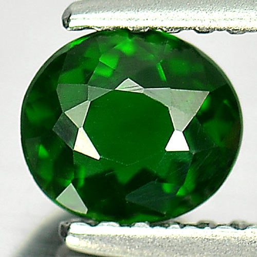 Green Tourmaline 0.63 Ct. Oval Shape 6 x 5.2 Mm. Natural Gemstone Unheated From Nigeria: Product ID: 807244275 Product Name: Natural Tourmaline Weight: 0.63 CT. Size: 6 x 5.2 x 3.3 MM. Shape: Oval Color: Forest Green Clarity:VSI Luster: Good Gems Origin: Nigeria Treatment: Unheated Crysta