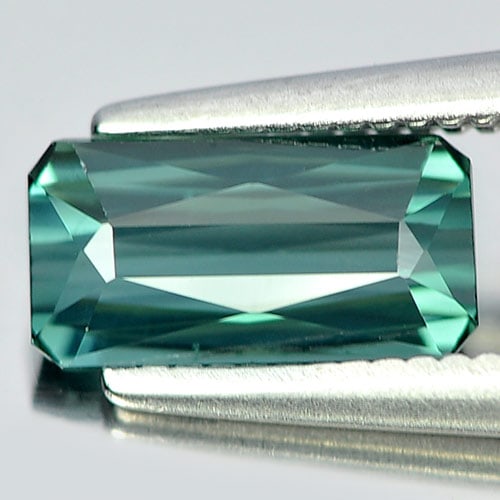 Green Tourmaline 0.96 Ct. Clean Octagon Shape 8.1 x 4.2 Mm. Natural Unheated Gemstone From Nigeria: Product ID: 807232316 Product Name: Natural Tourmaline Weight: 0.96 CT. Size: 8.1 x 4.2 x 3.1 MM. Shape: Octagon Color: Green Clarity:IF Luster: Good Gems Origin: Nigeria Treatment: Unheated Crystal S