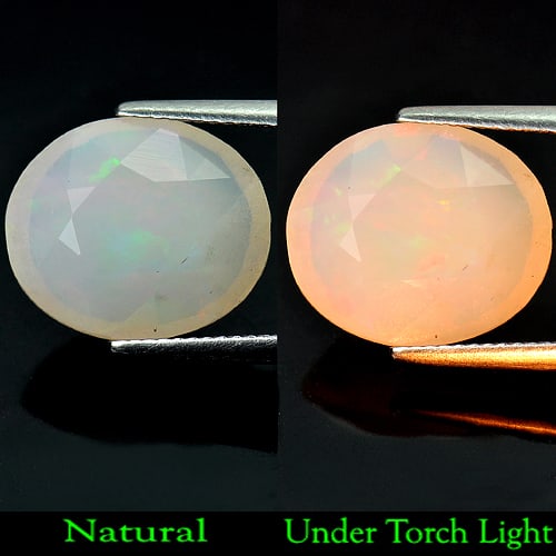 Multi Color Opal 5.88 Ct. Oval Shape 15.3 x 13.1 Mm. Natural Gemstone From Ethiopia: Product ID: 818711113 Product Name: Natural Opal Weight: 5.88 CT. Size: 15.3 x 13.1 x 7.3 MM. Shape: Oval Color: Multi Color Clarity:Semi - Transparent Luster: Good Gems Origin: Ethiopia Treatment: Un