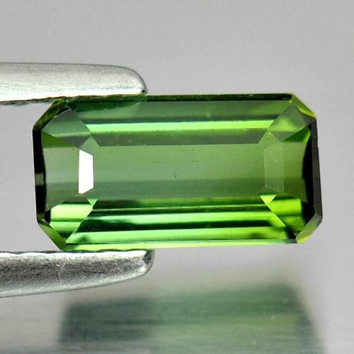 Green Tourmaline 1.10 Ct. Octagon Shape 8.1 x 4.3 Mm. Unheated Natural Gemstone From Nigeria: Product ID: 807238813 Product Name: Natural Tourmaline Weight: 1.10 CT. Size: 8.1 x 4.3 x 3.4 MM. Shape: Octagon Color: Green Clarity:VSI Luster: Good Gems Origin: Nigeria Treatment: Unheated Crystal 