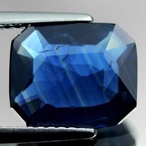 Certified Natural Blue Sapphire 4.01 Ct. Octagon Shape 10.69 x 9.01 Mm. Gemstone From Thailand: Product ID: 806006540 Product Name: Natural Blue Sapphire Weight: 4.01 CT. Size: 10.69 x 9.01 x 3.77 MM. Shape: Octagon Color: Blue Clarity:VSI Luster: Good Gems Origin: Thailand Treatment: Heated Cry