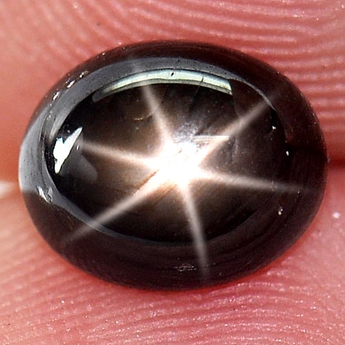 Natural Black Star Sapphire 6 Rays 2.18 Ct. Oval Cabochon Shape 7.8 x 6.4 Mm. Gemstone From Thailand: Product ID: 806141682 Product Name: Natural Star Sapphire Weight: 2.18 CT. Size: 7.8 x 6.4 x 3.8 MM. Shape: Oval Cabochon Color: Black Clarity:Opaque Luster: Good 6 Rays Star Gems Origin: Thailand Tre