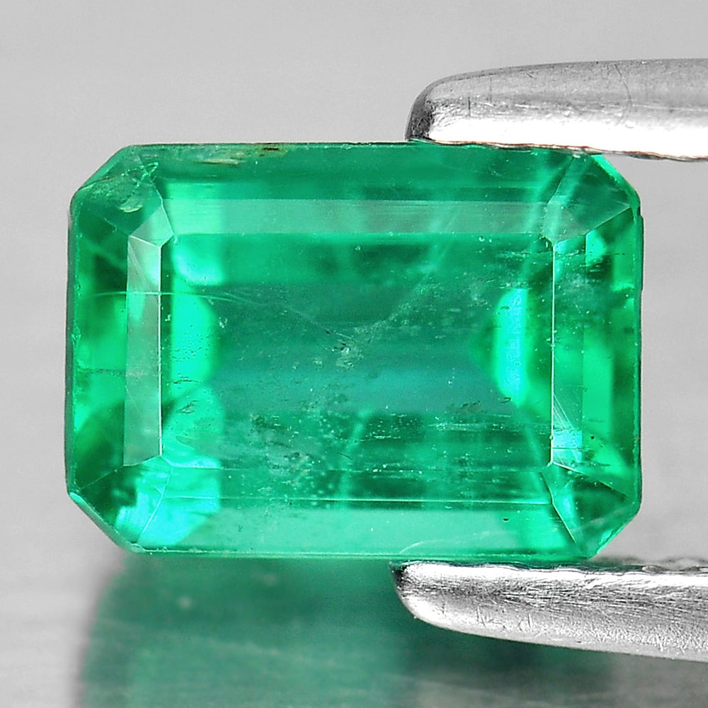 Certified Natural Green Emerald 1.16 Ct. Octagon Shape 7.05 x 5.11 Mm. Gemstone: Product ID: 802403700 Product Name: Natural Emerald Weight: 1.16 CT. Size: 7.05 x 5.11 x 3.98 MM. Shape: Octagon Color: Green Clarity:SI1 Luster: Good Gems Origin: Columbia Treatment: Unheated Crystal