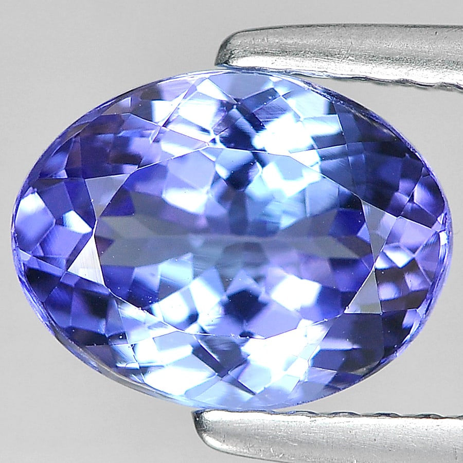 Violetish Blue Tanzanite 1.98 Ct. Oval Shape 8.9 x 6.9 Mm. Natural Gemstone From Tanzania: Product ID: 807009031 Product Name: Natural Tanzanite Weight: 1.98 CT. Size: 8.9 x 6.9 x 4.5 MM. Shape: Oval Color: Violetish Blue Clarity:VSI Luster: Good Gems Origin: Tanzania Treatment: Heated Crys