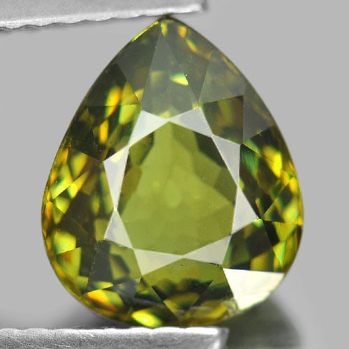 Certified Natural Green Demantoid Garnet 2.64 Ct. Pear Shape 9.18 x 7.69 Mm. Gemstone From: Product ID: 802918264 Product Name: Natural Demantoid Weight: 2.64 CT. Size: 9.18 x 7.69 x 4.56 MM. Shape: Pear Color: Green Clarity:VSI Luster: Very Good Gems Origin: Madagascar Treatment: Unheated C