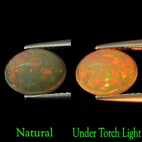 Natural Multi Color Opal 1.28 Ct. Oval Shape 9.2 x 7.1 Mm. Gemstone From Ethiopia: Product ID: 818727035 Product Name: Natural Opal Weight: 1.28 CT. Size: 9.2 x 7.1 x 4 MM. Shape: Oval Cabochon Color: Multi-Color Clarity:Semi - Transparent Luster: Iridescent Gems Origin: Ethiopia Tr