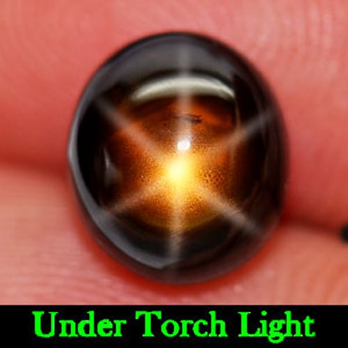 Certified Golden Star 6 Ray Sapphire 4.28 Ct. Oval Cabochon Shape 7.46 x 8.50 Mm. Natural Gemstone: Product ID: 806149953 / Product Name: Natural Star Sapphire / Weight: 4.28 CT. / Size: 7.46 x 8.50 x 5.56 MM. / Shape: Oval Cabochon / Color: Yellow / Clarity:Opaque / Luster: Good 6 Ray Star / Gems O