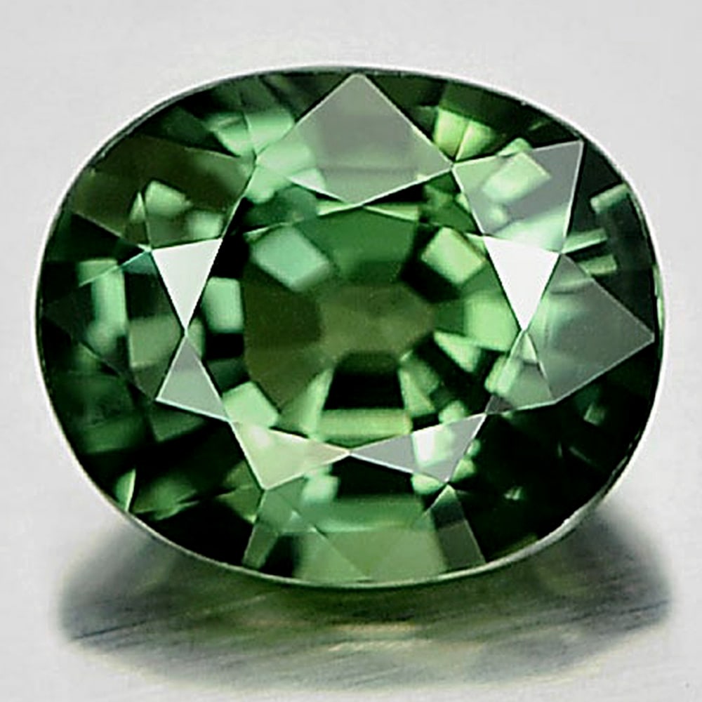 Natural Green Sapphire 1.63 Ct. Clean Oval Shape 7.6 x 6.3 Mm. Gemstone From Thailand: Product ID: 806156576 / Product Name: Natural Green Sapphire / Weight: 1.63 CT. / Size: 7.6 x 6.3 x 4.2 MM. / Shape: Oval / Color: Green / Clarity:IF / Luster: Very Good / Gems Origin: Thailand / Trea