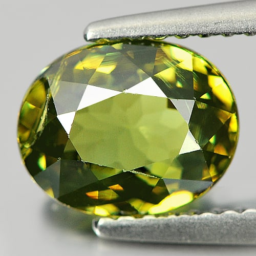Certified Natural Green Demantoid Garnet 2.06 Ct. Oval Shape 8.36 x 6.70 Mm. Gemstone From: Product ID: 802914332 / Product Name: Natural Demantoid / Weight: 2.06 CT. / Size: 8.36 x 6.70 x 4.09 MM. / Shape: Oval / Color: Green / Clarity:SI / Luster: Very Good / Gems Origin: Madagascar , Afri