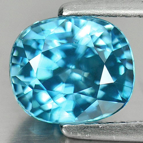 Natural Blue Zircon 2.75 Ct. Clean Cushion Shape 7.7 x 6.7 Mm. Gemstone From Cambodia: Product ID: 807728143 / Product Name: Natural Zircon / Weight: 2.75 CT. / Size: 7.7 x 6.7 x 5 MM. / Shape: Cushion / Color: Blue / Clarity:IF / Luster: Very Good / Gems Origin: Cambodia / Treatment: H