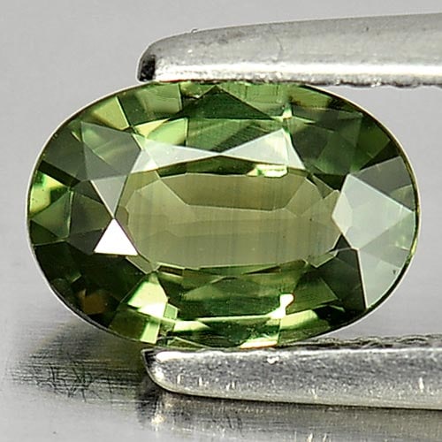 Natural Green Sapphire 0.97 Ct. VVS Oval Shape 7.6 x 5.3 Mm. Gemstone Heated Only From Thailand: Product ID: 806146436 / Product Name: Natural Green Sapphire / Weight: 0.97 CT. / Size: 7.6 x 5.3 x 2.7 MM. / Shape: Oval / Color: Green / Clarity:VVS / Luster: Good / Gems Origin: Thailand / Treatmen