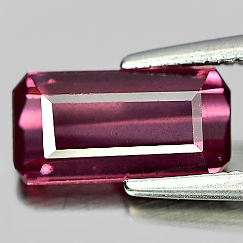 Natural Purplish Pink Rhodolite Garnet 1.65 Ct. Octagon Shape 9.2 x 4.8 Mm. Gemstone: Product ID: 802934477 / Product Name: Natural Rhodolite / Weight: 1.65 CT. / Size: 9.2 x 4.8 x 3.2 MM. / Shape: Octagon / Color: Pink / Clarity:VSI / Luster: Good / Gems Origin: Madagascar / Treatment