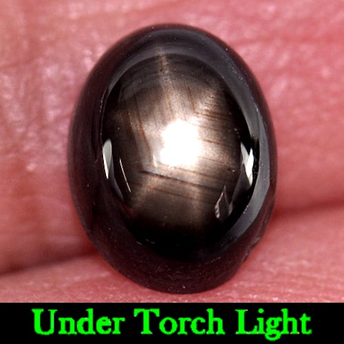 Black Star Sapphire 6 Rays 3.51 Ct. Oval Cabochon Shape 8.9 x 7 Mm. Natural Gemstone From Thailand: Product ID: 806140497 / Product Name: Natural Star Sapphire / Weight: 3.51 CT. / Size: 8.9 x 7 x 4.7 MM. / Shape: Oval Cabochon / Color: Black / Clarity:Opaque / Luster: Good 6 Rays Star / Gems Origin