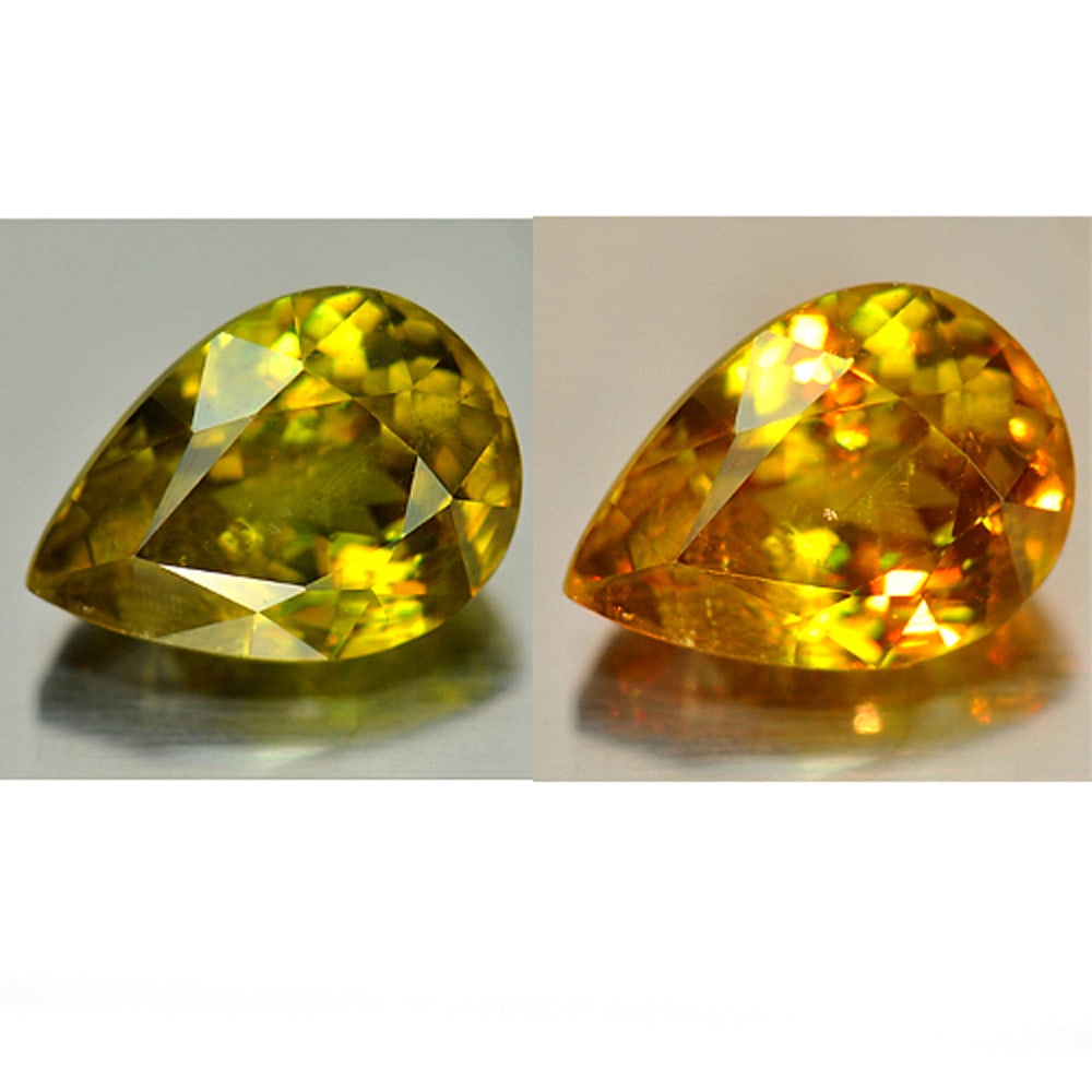 Multi Color Titanium Sphene Red Spark 2.55 Ct. Pear Shape 9.6 x 7 Mm. Natural Gemstone Unheated: Product ID: 806505158 / Product Name: Natural Sphene / Weight: 2.55 CT. / Size: 9.6 x 7 x 5 MM. / Shape: Pear / Color: Multi Color With Red Spark / Clarity:VSI / Luster: Good / Gems Origin: Madagascar