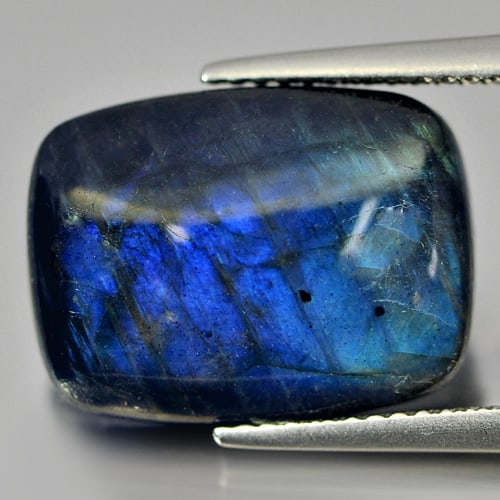 Multi Color Blue Labradorite Doublet 9.12 Ct. Baguette Cabochon Shape 16 x 11.9 Mm. Natural Gemstone: Product ID: 804301222 / Product Name: Natural Labradorite / Weight: 9.12 CT. / Size: 16 x 11.9 x 4.9 MM. / Shape: Baguette Cabochon / Color: Multi-Color / Clarity:Opaque / Luster: Iridescent / Gems Or