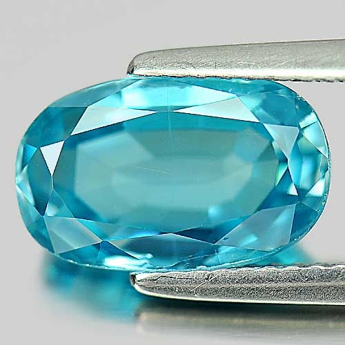 Blue Zircon 5.09 Ct. Oval Shape 11.5 x 7.1 Mm. Natural Gemstone From Cambodia: Product ID: 807727441 / Product Name: Natural Zircon / Weight: 5.09 CT. / Size: 11.5 x 7.1 x 4.8 MM. / Shape: Oval / Color: Blue / Clarity:VSI / Luster: Good / Gems Origin: Cambodia / Treatment: Heate