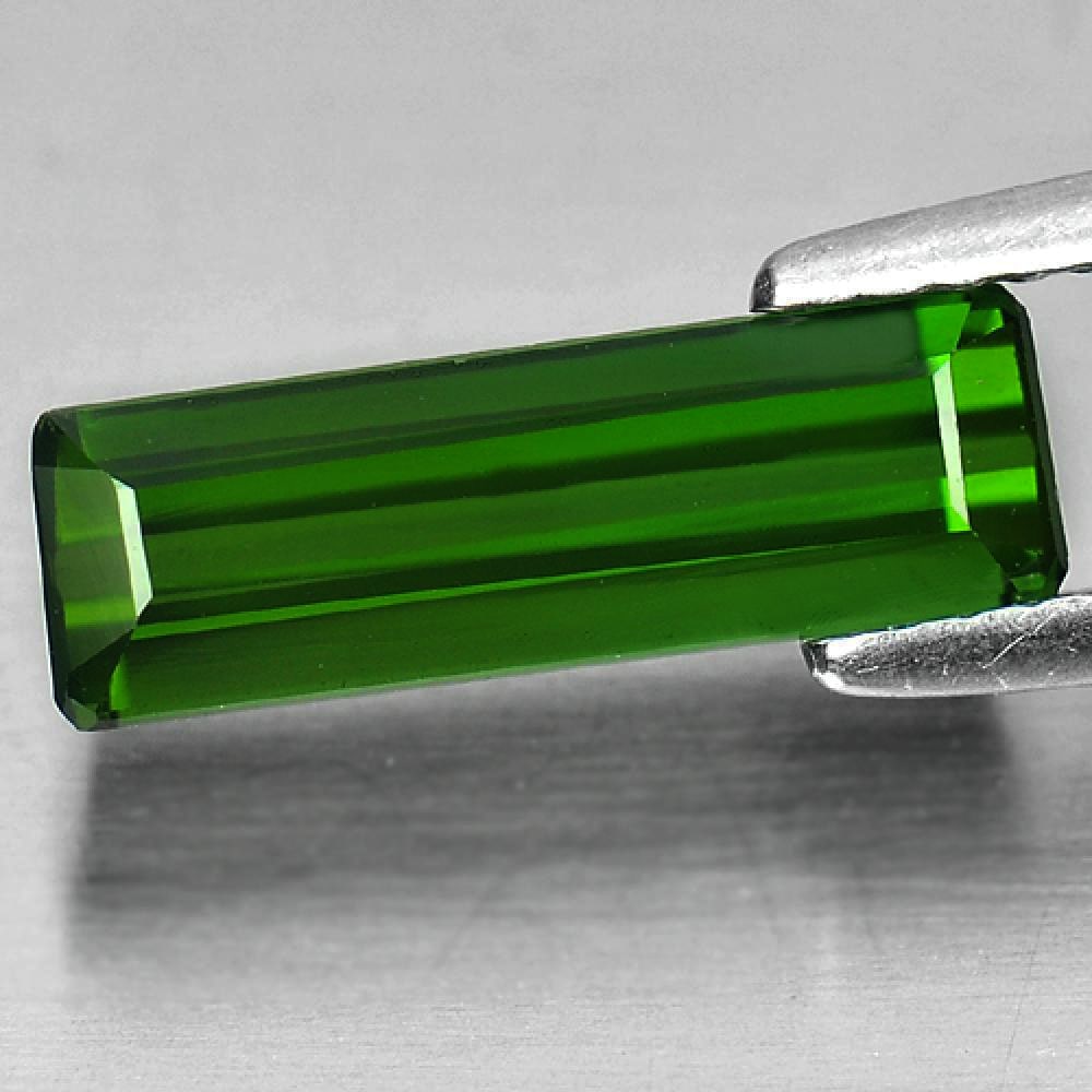 Green Tourmaline 1.97 Ct. Clean Octagon Shape 13.4 x 4.3 Mm. Natural Unheated Gemstone From Nigeria: Product ID: 807243140 / Product Name: Natural Tourmaline / Weight: 1.97 CT. / Size: 13.4 x 4.3 x 3.6 MM. / Shape: Octagon / Color: Green / Clarity:IF / Luster: Good / Gems Origin: Nigeria / Treatment: