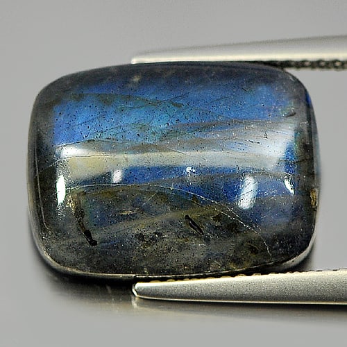 Multi Color Blue Labradorite Doublet 9.40 Ct. Baguette Cabochon Shape Natural Gemstone: Product ID: 804301202 / Product Name: Natural Labradorite / Weight: 9.40 CT. / Size: 16 x 11.9 x 5 MM. / Shape: Baguette Cabochon / Color: Multi-Color / Clarity:Opaque / Luster: Iridescent / Gems Orig