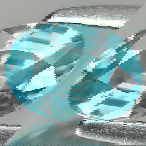 Blue Zircon 1.24 Ct. VVS Oval Shape 7.1 x 5.2 Mm. Natural Gemstone From Cambodia: Product ID: 807715342 / Product Name: Natural Zircon / Weight: 1.24 CT. / Size: 7.1 x 5.2 x 3.4 MM. / Shape: Oval / Color: Blue / Clarity:VVS / Luster: Good / Gems Origin: Cambodia / Treatment: Heated