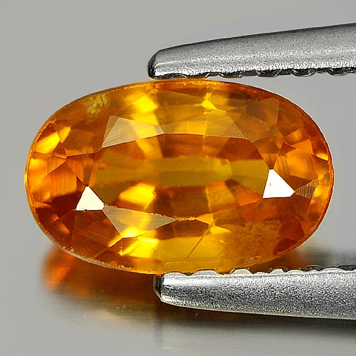 Orangish Yellow Sapphire 1.11 Ct. Oval Shape 7.5 x 4.8 Mm. Natural Gemstone From Thailand: Product ID: 806151130 / Product Name: Natural Yellow Sapphire / Weight: 1.11 CT. / Size: 7.5 x 4.8 x 3.5 MM. / Shape: Oval / Color: Orangish Yellow / Clarity:SI1 / Luster: Good / Gems Origin: Thailand
