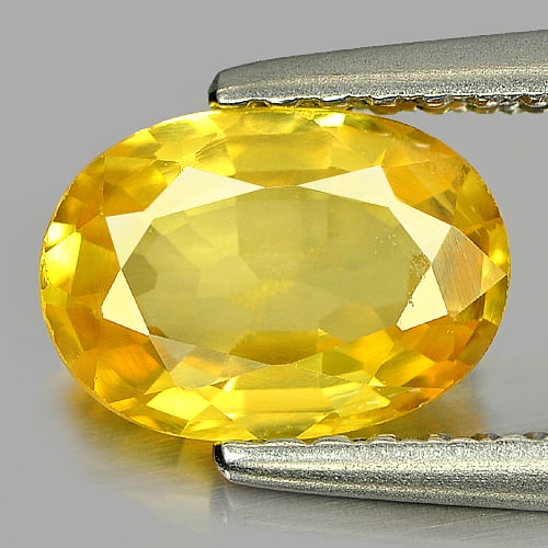 Yellow Sapphire 1.33 Ct. Oval Shape 7.9 x 5.6 Mm. Natural Gemstone From Thailand: Product ID: 806160902 / Product Name: Natural Yellow Sapphire / Weight: 1.33 CT. / Size: 7.9 x 5.6 x 3 MM. / Shape: Oval / Color: Yellow / Clarity:VSI / Luster: Very Good / Gems Origin: Thailand / Tre
