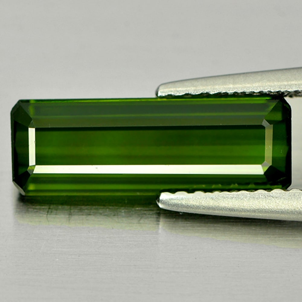 Green Tourmaline 2.28 Ct. VVS Octagon 13.8 x 4.8 Mm. Natural Gemstone From Nigeria: Product ID: 807243174 / Product Name: Natural Tourmaline / Weight: 2.28 CT. / Size: 13.8 x 4.8 x 3.6 MM. / Shape: Octagon / Color: Green / Clarity:VVS / Luster: Good / Gems Origin: Nigeria / Treatment
