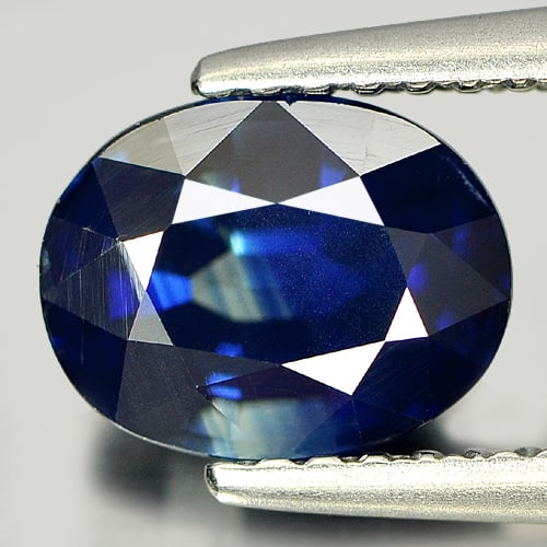 Blue Sapphire Certified 1.86 Ct. Oval Shape 7.94 x 6.18 Mm. Natural Gemstone From Thailand: Product ID: 806005576 / Product Name: Natural Blue Sapphire / Weight: 1.86 CT. / Size: 7.94 x 6.18 x 4.30 MM. / Shape: Oval / Color: Blue / Clarity:VSI / Luster: Good / Gems Origin: Thailand / Treatme