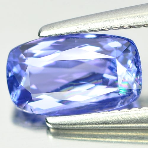 Violetish Blue Tanzanite 1.04 Ct. Cushion Shape 8 x 4.8 Mm. Natural Gemstone From Tanzania: Product ID: 807004260 Product Name: Natural Tanzanite Weight: 1.04 CT. Size: 8 x 4.8 x 3.4 MM. Shape: Cushion Color: Blue Clarity:SI Luster: Very Good Gems Origin: Tanzania Treatment: Heated Crystal S