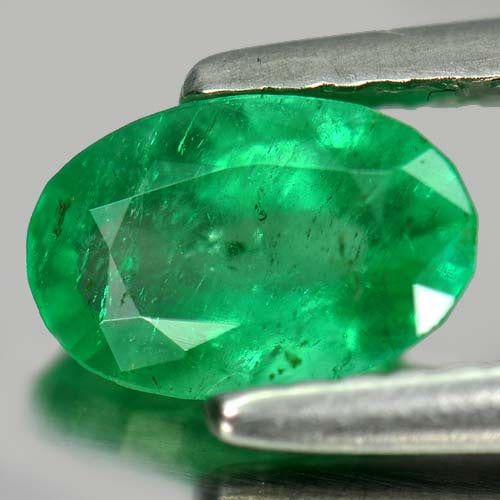 Green Emerald 0.91 Ct. Oval Shape 7.5 x 5.1 Mm. Natural Gemstone From Columbia: Product ID: 802401730 Product Name: Natural Emerald Weight: 0.91 CT. Size: 7.5 x 5.1 x 3.9 MM. Shape: Oval Color: Green Clarity:SI Luster: Good Gems Origin: Columbia Treatment: Unheated Crystal Struct
