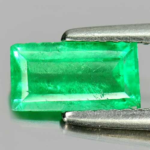 Green Emerald 0.94 Ct. Baguette Shape 8.5 x 4.7 Mm. Natural Gemstone From Columbia: Product ID: 802402879 Product Name: Natural Emerald Weight: 0.94 CT. Size: 8.5 x 4.7 x 3.2 MM. Shape: Baguette Color: Green Clarity:SI1 Luster: Good Gems Origin: Columbia Treatment: Unheated Crystal S
