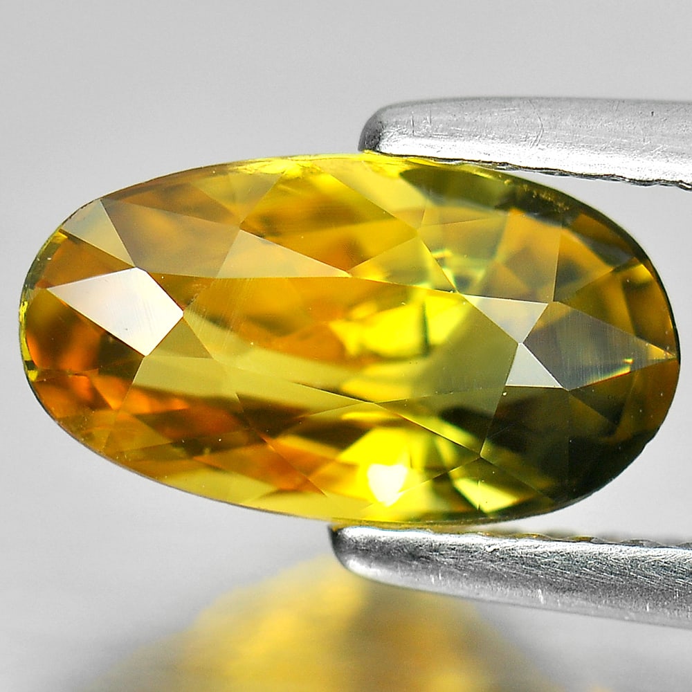 Greenish Yellow Sapphire 2.01 Ct. VS Oval Shape 10.2 x 5.7 Mm. Natural Gemstone From Thailand: Product ID: 806145808 Product Name: Natural Yellow Sapphire Weight: 2.01 CT. Size: 10.2 x 5.7 x 4.2 MM. Shape: Oval Color: Greenish Yellow Clarity:VS Luster: Very Good Gems Origin: Thailand Treatment: