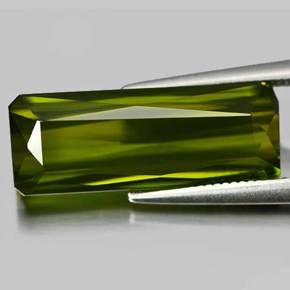 Green Tourmaline 9.28 Ct. VVS Octagon Shape 19.6 x 7.5 Mm. Natural Unheated Gemstone From Nigeria: Product ID: 807239296 Product Name: Natural Tourmaline Weight: 9.28 CT. Size: 19.6 x 7.5 x 6.3 MM. Shape: Octagon Color: Green Clarity:VVS Luster: Good Gems Origin: Nigeria Treatment: Unheated Crystal