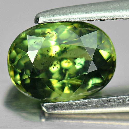 Certified Green Demantoid Garnet 2.14 Ct. Oval Shape 8.25 x 6.21 Mm. Natural Gemstone From: Product ID: 802914320 Product Name: Natural Demantoid Weight: 2.14 CT. Size: 8.25 x 6.21 x 4.84 MM. Shape: Oval Color: Green Clarity:VSI Luster: Very Good Gems Origin: Madagascar Treatment: Unheated C